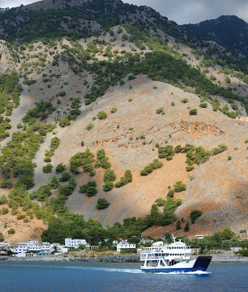 The ferryboat 'Samaria' leaving the village of Agia Roumeli